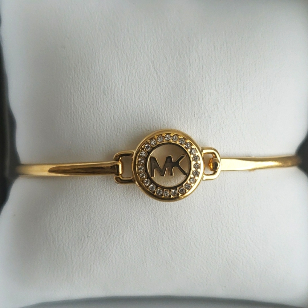 Michael Kors gold tone bangle